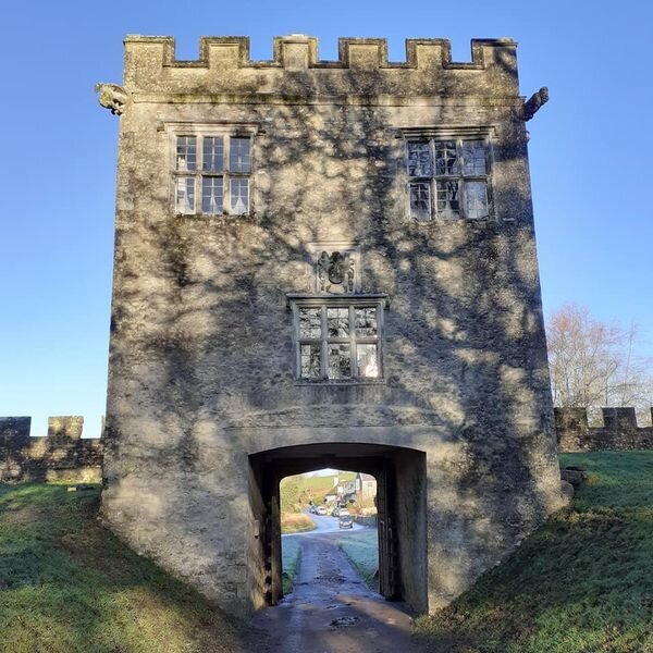  The old gatehouse of the Shute Barton estate provides entrance through the curtain wall of the fortified manor house built in around 1565
